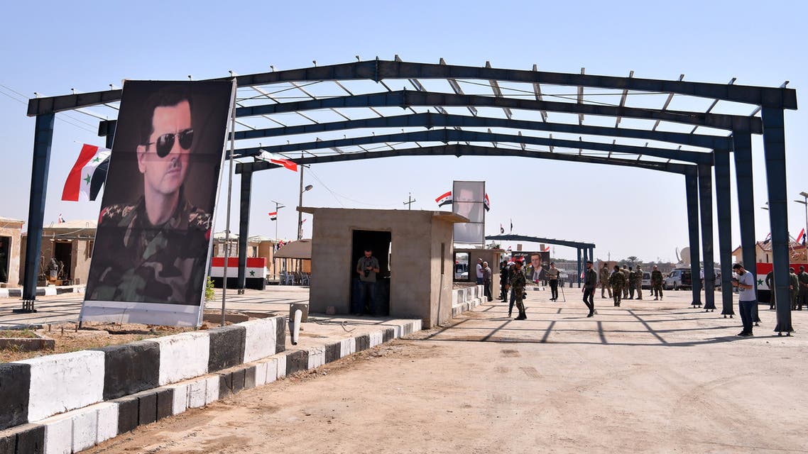 صورة لبشار الأسد (أرشيفية- فرانس برس)