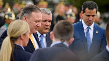 US Secretary of State Mike Pompeo (L), Colombian President Ivan Duque (C) and Venezuelan opposition leader Juan Guaido walk during the inauguration of the III Hemispheric Ministerial Conference of Fight Against Terrorism in Bogota, on January 20, 2020. (AFP)