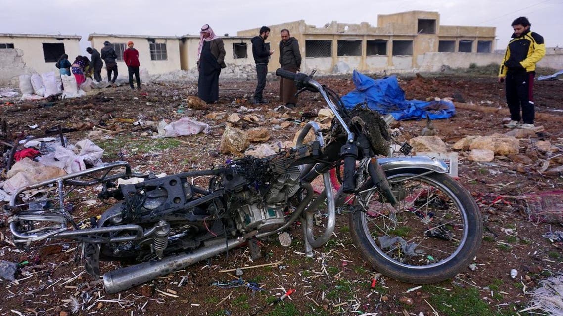 Syrians gather at the site of a Russian air strike in the village of Jubass on the outskirts of Saraqeb in Syria's northwestern province of Idlib, on December 24, 2019. (File photo: AFP)