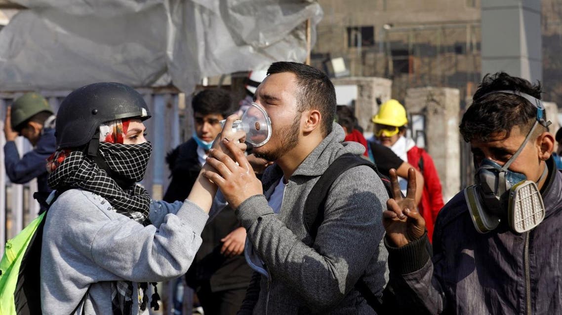 An Iraqi demonstrator receives medical help after being affected by tear gas during ongoing anti-government protests, in Baghdad, Iraq January 20, 2020. (Photo: Reuters)