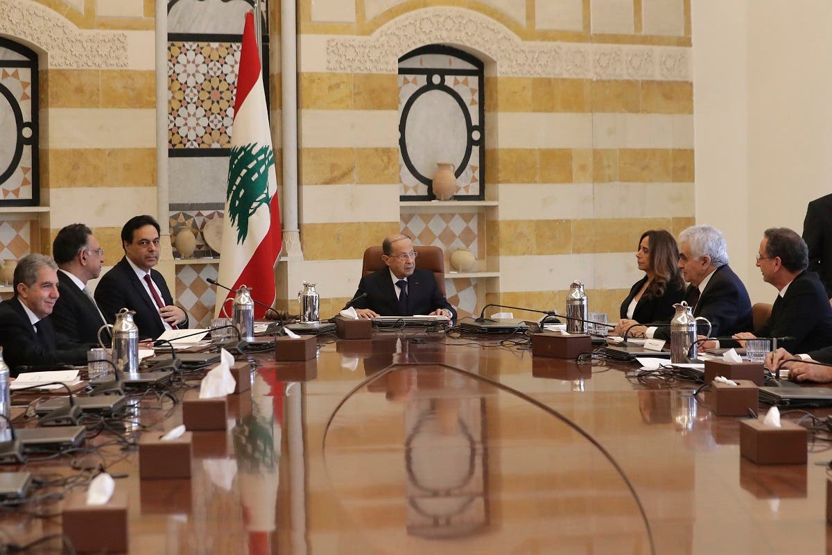 President Michel Aoun, center, speaks with Deputy Prime Minister and Minister of Defense Zeina Akr, center, right as Prime Minister Hassan Diab, center left, looks on during the cabinet meeting at the presidential palace in Baabda, east of Beirut, Lebanon Wednesday, Jan. 22, 2020. (Photo: AP)