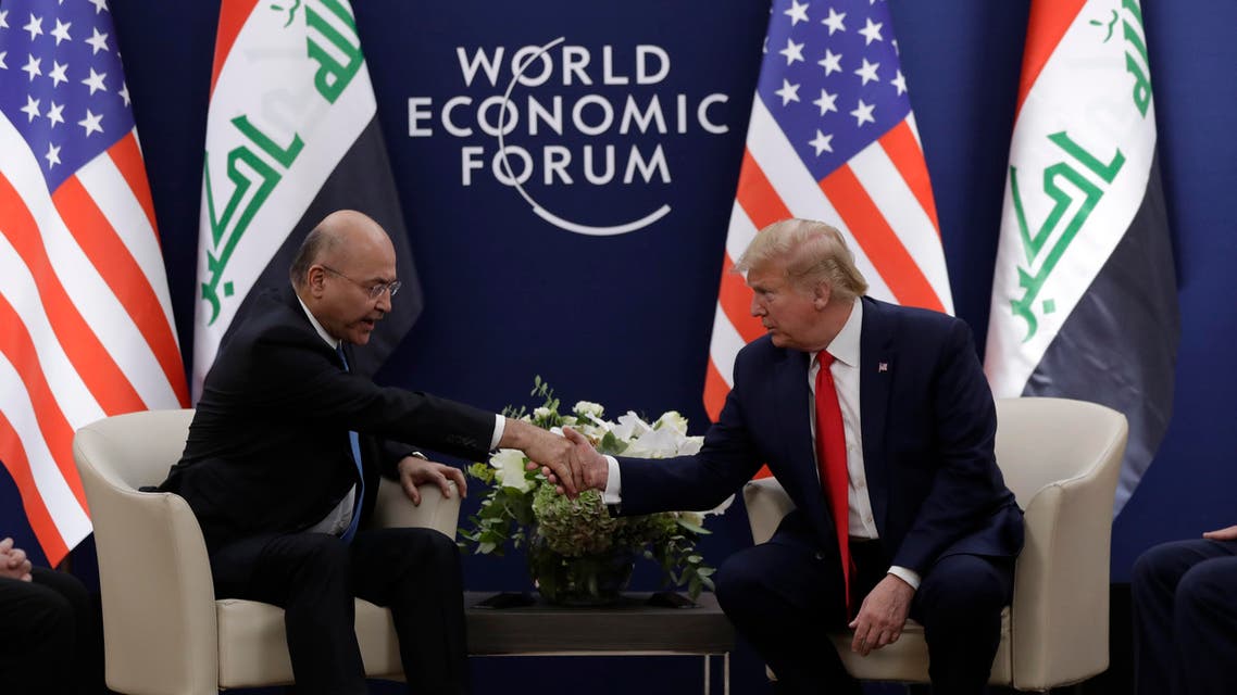 US President Donald Trump meets with IRaqi President Barham Salih in Davos (AP)