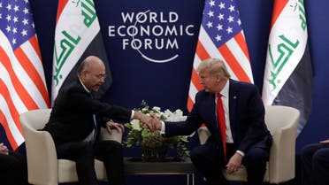 US President Donald Trump meets with IRaqi President Barham Salih in Davos (AP)