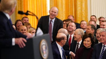 Boeing CEO Dave Calhoun is recognized during a ceremony to sign a trade agreement between the US and China in the East Room of the White House in Washington, DC, on January 15, 2020. (AFP)