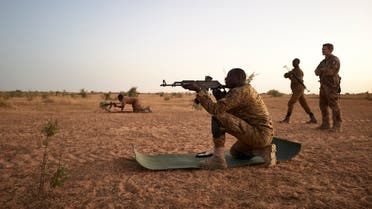 Soldiers of the Burkina Faso Army take part in shooting exercises during a joint operation with the French Army in the Soum region in northern Burkina Faso on November 12, 2019.