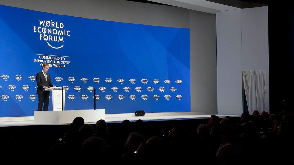 The President of the World Economic Forum Borge Brende stands on the stage. (AP)