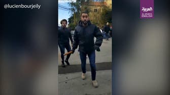 Pro-Amal supporters shown attacking Lebanese protesters in southern Beirut