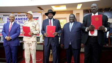 South Sudan's President Mayardit, deputy head of SPLM Arman, head of the military council Lieutenant General Dagalo, Chairman Galwak and SPLM-N chief of staff General El-Omda pose after the signing the Sudan's initial deal with rebel group in Juba. (Reuters)