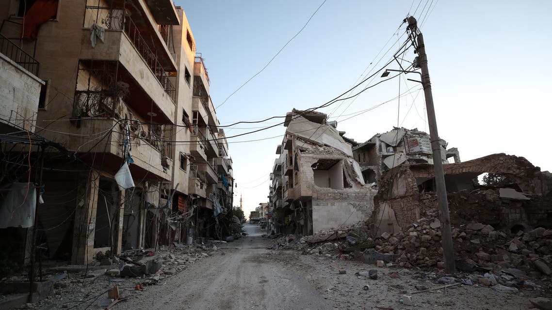 Damaged buildings that were hit during recent air strikes by pro-regime forces in the jihadist-held city of Maaret al-Numan in Syria's northwestern Idlib province are pictured on January 25, 2020. (AFP)