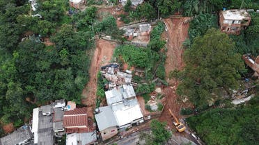 Aerial view showing rescue workers searching for five victims who were buried by a landslide in Jardim Alvorada neighbourhood in Belo Horizonte, state of Minas Gerais, Brazil. (AFP)