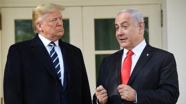 US President Donald Trump greets Israeli Prime Minister Benjamin Netanyahu as he arrives for meeting on the South Lawn of the White House in Washington, DC, January 27, 2020. (AFP) 