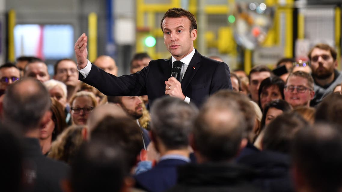 French President Emmanuel Macron speaks during a visit at the AstraZeneca factory in Dunkirk, northern France, on January 20, 2020, before the summit Choose France.
