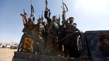 Newly recruited Houthi fighters chant slogans as they ride a military vehicle during a gathering in the capital Sanaa to mobilize more fighters to battlefronts to fight pro-government forces in several Yemeni cities, on January 3, 2017.