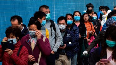 Customers queue to buy facial masks to prevent an outbreak of a new coronavirus, in Hong Kong, China January 28, 2020. (Photo: Reuters)
