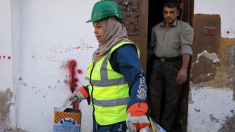 Jordanian women go door-to-door recycling trash