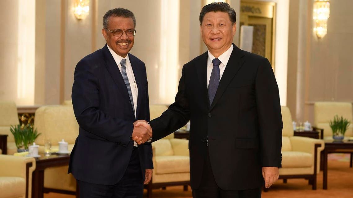 World Health Organization director general Tedros Adhanom (L) shakes hands with Chinese President Xi jinping before a meeting at the Great Hall of the People in Beijing on January 28, 2020. (AFP)