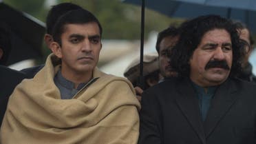 Mohsin Dawar (L) and Ali Wazir, member of parliament from the North Waziristan tribal district, lead a protest rally against the detention of Manzoor Pashteen, chief of the Pashtun Protection Movement (PTM), in Islamabad on January 28, 2020. (AFP)