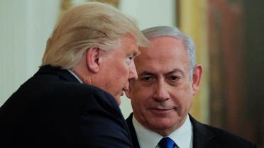 Trump and Netanyahu talk in the midst of a joint news conference on a new Middle East peace plan proposal in the East Room of the White House in Washington, January 28, 2020. (Reuters)