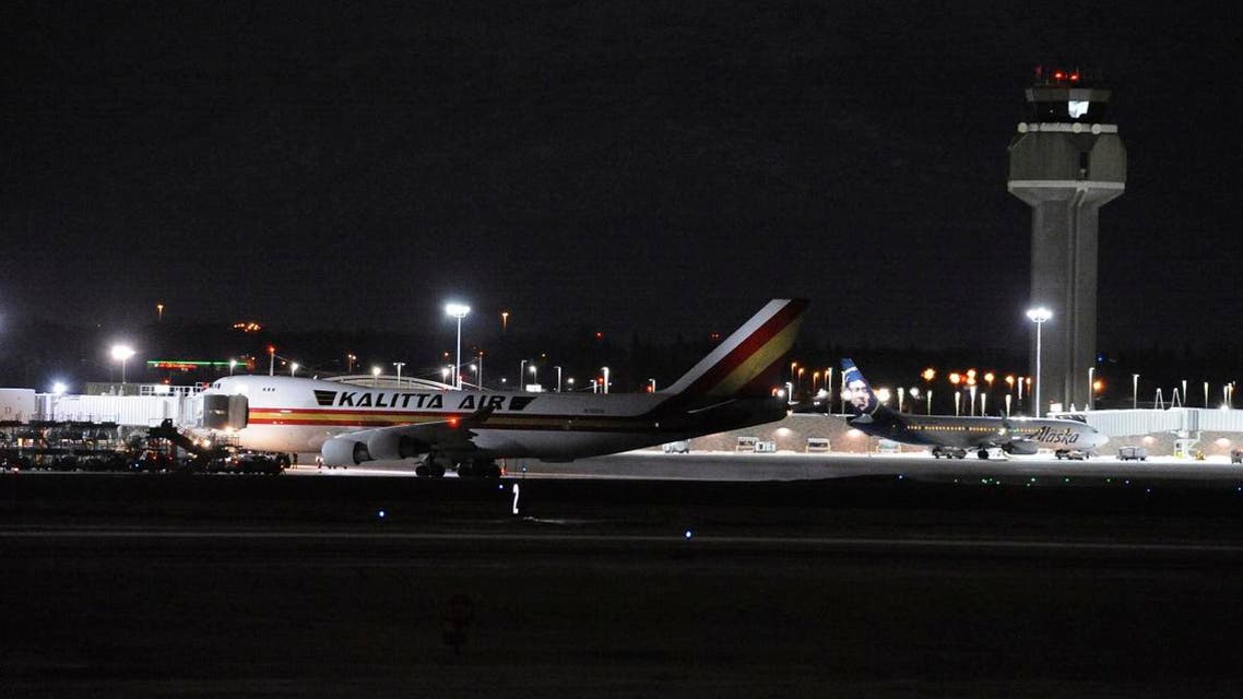 Carrying some 240 American diplomats and citizens, a Boeing 747 aircraft sits on the tarmac of Ted Stevens Anchorage International Airport in Anchorage, Alaska. (Photo: AP)