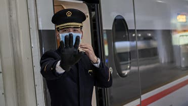 Coronavirus train man stop sign AFP