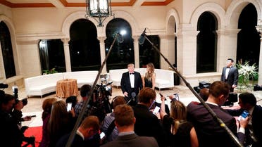 U.S. President Donald Trump accompanied by first lady Melania Trump, speaks to the press at the Mar-a-Lago resort in Palm Beach, Florida, U.S. December 31, 2019. REUTERS