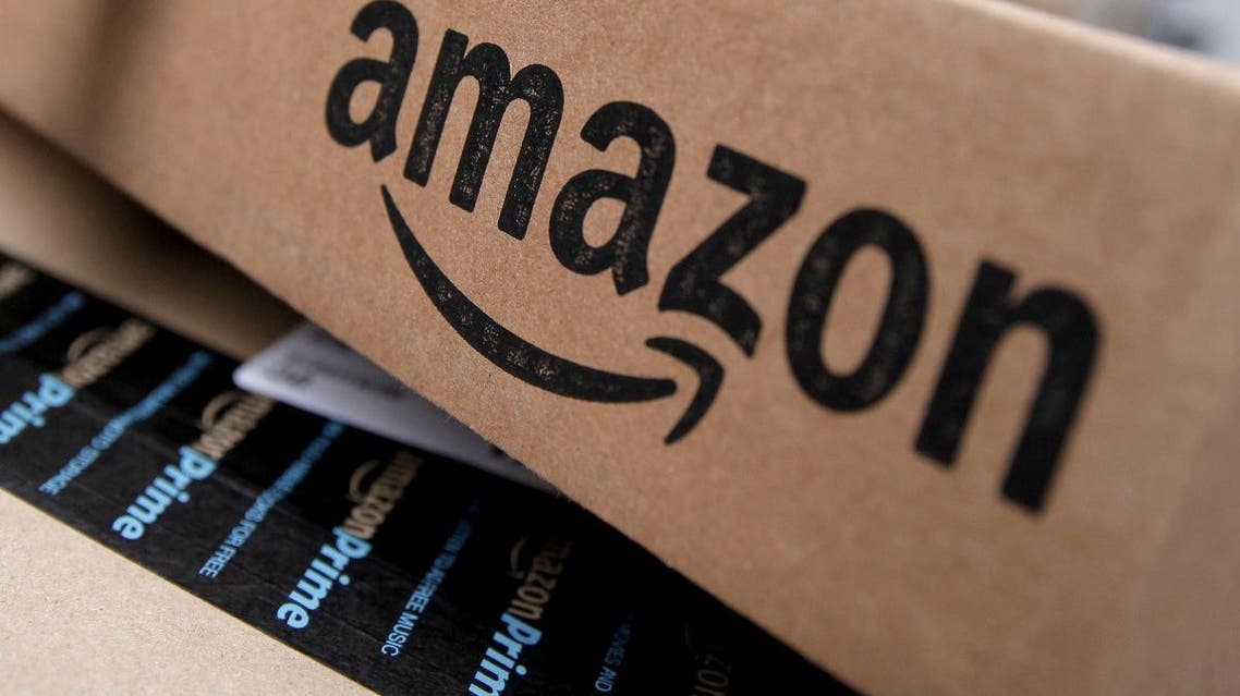 Amazon boxes are seen stacked for delivery in the Manhattan borough of New York City, January 29, 2016. REUTERS