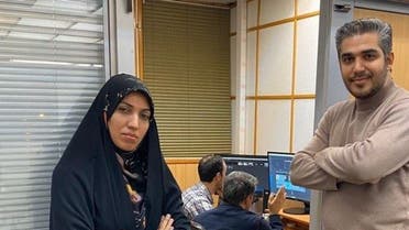 IRIB reporters Ameneh Sadat-Zabihpour and Ali Rezvani. (Twitter)