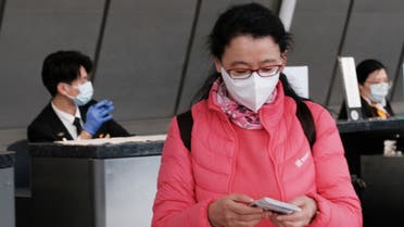 NEW YORK, NEW YORK - JANUARY 31: At the terminal that serves planes bound for China, people wear medical masks at John F. Kennedy Airport (JFK) out of concern over the Coronavirus on January 31, 2020 in New York City. The virus, which has so far killed over 200 people and infected an estimated 9,900 people, is believed to have started in the Chinese city of Wuhan. Spencer Platt/Getty Images/AFP