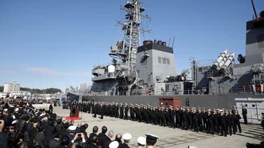 Japan's Prime Minister Shinzo Abe (center L) speaks during a ceremony to mark the departure of Japan's Maritime Self-Defense Force destroyer "Takanami" for the Middle East. (Photo: AFP)