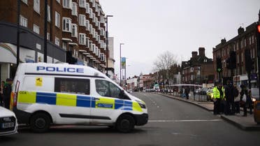 Police at the scene after an incident in Streatham, London, Sunday Feb. 2, 2020. (AP)