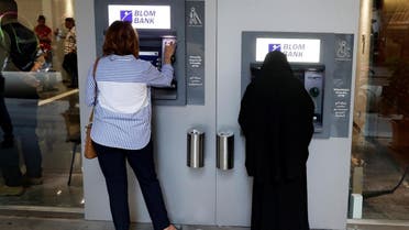Women use ATMs at Blom bank in Beirut, Lebanon. (Reuters)