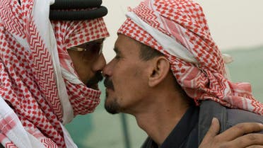 Two Gulf Arab men greet each other in the traditional tribal (Bedoine) fashion by touching each other's nose. (File photo: Reuters)