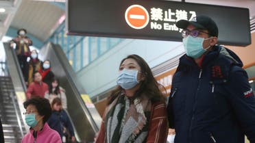 People wear masks at a metro station in Taipei, Taiwan, Tuesday, Jan. 28, 2020. (AP)