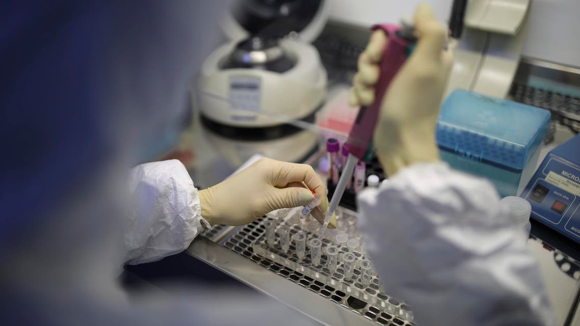 A medical staffer works with test systems for the diagnosis of coronavirus in Krasnodar, Russia on Feb. 4, 2020. (AP)