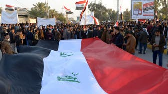 Demonstrators in Iraq take to street unmasked amid pandemic