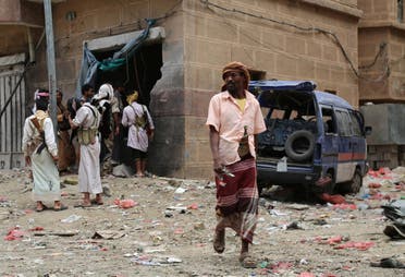 Yemenis look at the damage after Iran-backed militia fired Katyusha rockets at a busy market in Yemen's Marib province, east of the capital, Sanaa, on September 11, 2015. (Reuters)