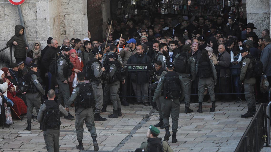Israeli border police blocks exit of the Old City's Damascus gate ahead of a protest against Middle East peace plan announced Tuesday by US President Donald Trump, which strongly favors Israel, in Jerusalem, Wednesday, Jan 29, 2020. (AP Photo/Mahmoud Illean)