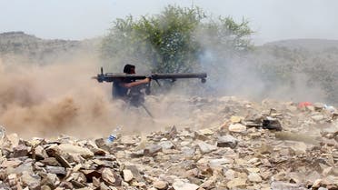 A Yemeni pro-government fighter fires a recoilless rocket launcher weapon as Saudi and Emirati supported forces take over Huthi bases on the frontline of Kirsh between the province of Taez and Lahj, southwestern Yemen, on July 1, 2018. The United Arab Emirates on Sunday announced it had halted the offensive it is backing against Huthi rebels in Yemen's port city of Hodeida to give a chance to UN diplomatic efforts.