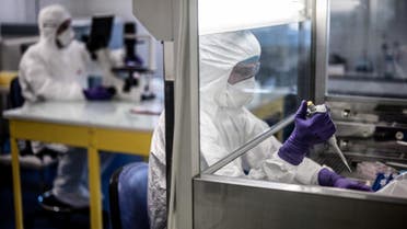 Scientists are at work in the VirPath university laboratory in Lyon, France, February 5, 2020 as they try to find an effective treatment against the new SARS-like coronavirus. (AFP)