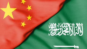 Two flags. Flag of the Kingdom of Saudi Arabia. Flag of the People's Republic of China. stock photo