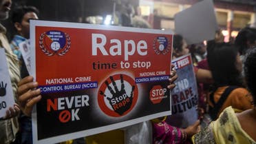 Demonstrators hold placards to protest against sexual assaults on women, following the alleged gang-rape and murder of a 27-year-old veterinarian in Hyderabad and other recent sexual assaults across the country, during a march in Kolkata on December 4, 2019. 