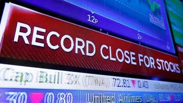 A television screen on the trading floor of the New York Stock Exchange headlines the closing Dow Jones industrial average. (AP)
