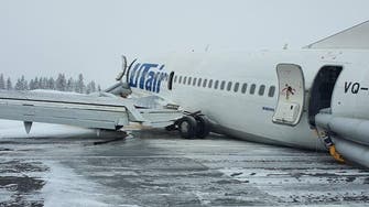 Russian plane carrying 100 people crash-lands on belly, no one hurt