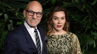 Sir Patrick Stewart, left, and Sunny Ozell arrive at the 2020 Chanel Pre-Oscar Dinner at The Beverly Hills Hotel on Saturday, Feb. 8, 2020, in Beverly Hills, Calif. (AP)