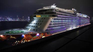 The cruise ship World Dream docked at Kai Tak cruise terminal as passengers leave the ship after being quarantined for the coronavirus in Hong Kong, on February 9, 2020. (AP)