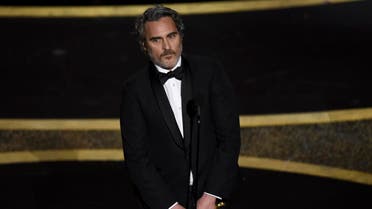 Joaquin Phoenix accepts the award for best performance by an actor in a leading role for "Joker" at the Oscars on Sunday, Feb. 9, 2020. (Photo: AP)