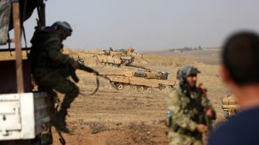 Turkish soldiers gather with their tanks at a position east of the northeastern Syrian town of Ras al-Ain on October 28, 2019. (File photo: AFP)