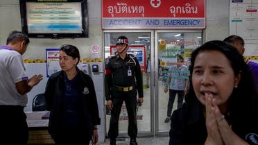 Military police stand outside an emergency room of a hospital where victims of the mass shooting are being treated in Korat, Nakhon Ratchasima, Thailand, on February 9, 2020. (AP)