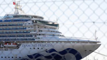 The cruise ship Diamond Princess, where dozens of passengers were tested positive for coronavirus, is seen through steel fence in Yokohama, south of Tokyo, Japan, February 11, 2020. (Reuters)