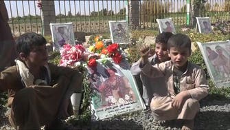 Videos show children recruited by Houthis chanting, visiting militants’ graves